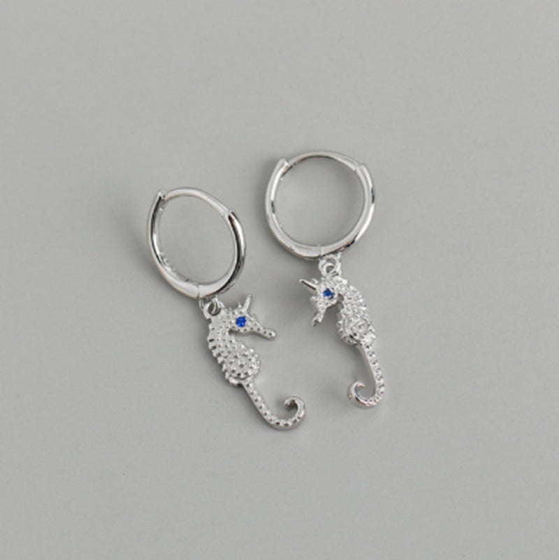 S925 Eye & Seahorse Huggie Earrings — product view